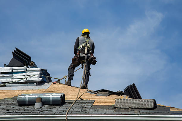 Professional Metal Roofing technician working in Holladay, TN